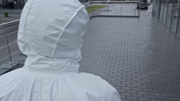 back view of scientist in protective suit - Footage, Video