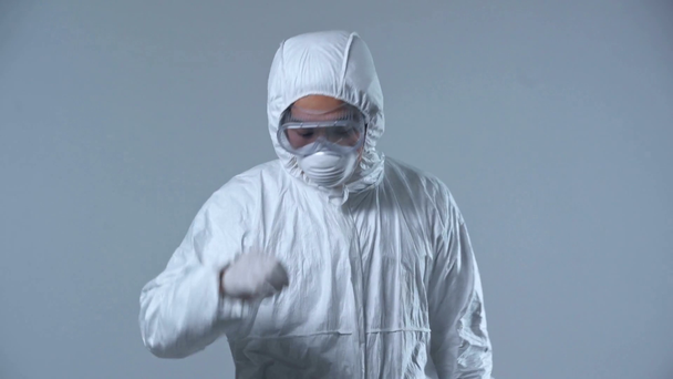 asian scientist dropping test tube isolated on grey  - Felvétel, videó