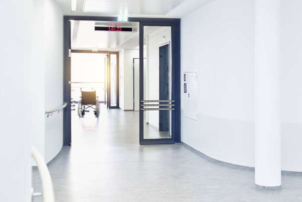 hospital with wheelchair in the hallway - Fotoğraf, Görsel