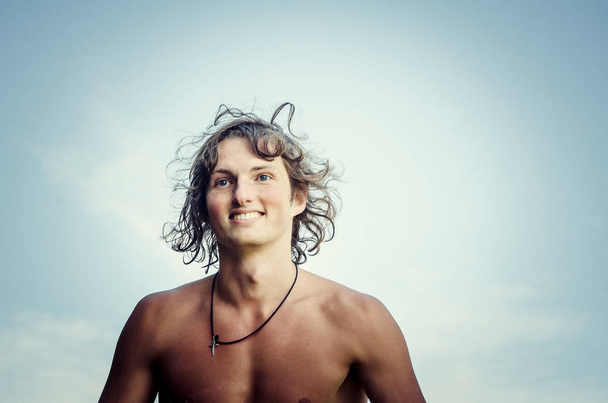 portrait of a young man on the beach - Photo, Image