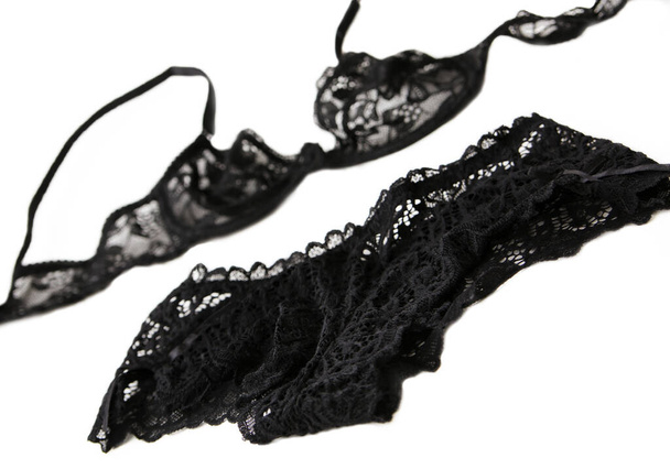 A set of black lacy women's underwear on a white background - Photo, Image