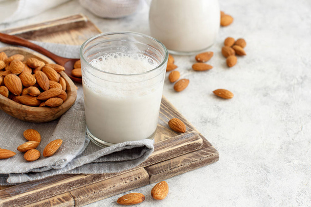 Vegan almond milk, non dairy alternative milk - Fotoğraf, Görsel