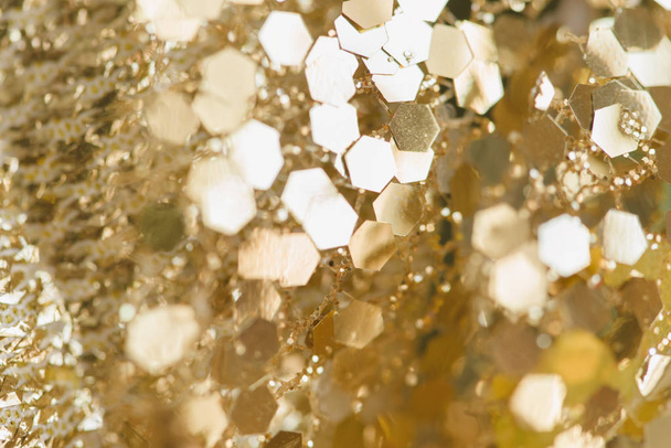 Golden holiday glowing abstract glitter defocused background - Φωτογραφία, εικόνα