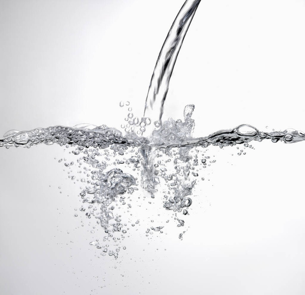 Water splash on white background - Fotografie, Obrázek