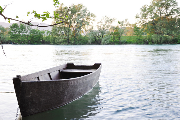 Old rowing boat on the river - Photo, Image