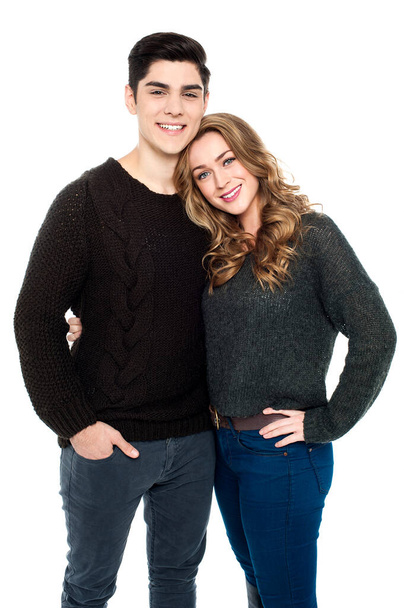 Fashionable young couple in warm clothing embracing each other. - Foto, immagini