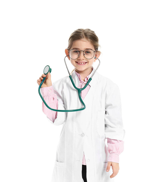 Cute little doctor on white background - Fotoğraf, Görsel
