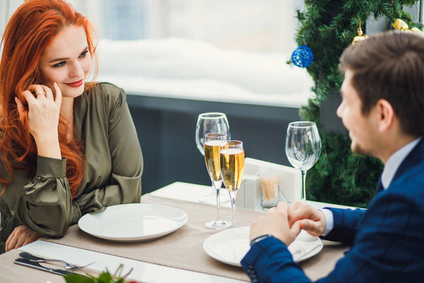 cute attractive lady sit with man in restaurant, on a date - Φωτογραφία, εικόνα