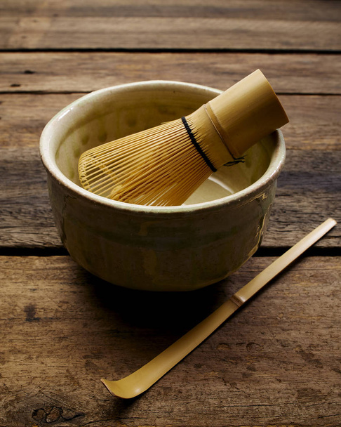 Japanese maccha green tea on wood plank - 写真・画像