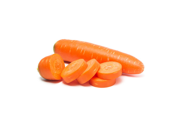 Fresh carrot and carrot slice isolated on white background. Clos - Photo, Image