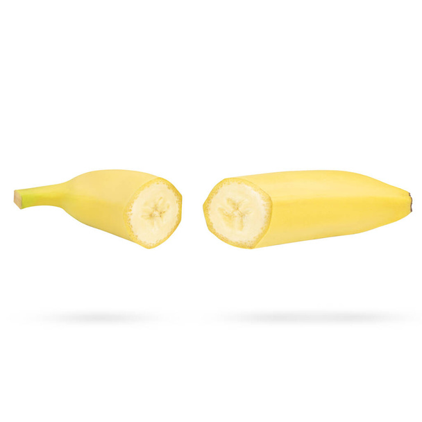 Grupo de duas metades de banana amarela fresca isolada sobre fundo branco
 - Foto, Imagem