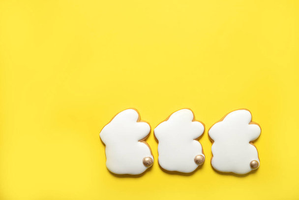 Easter cookies on a yellow background. Top view. Place for text. Easter bunny - Foto, Imagen