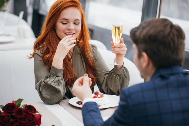 romantic guy makes marriage proposal to lady - Fotó, kép