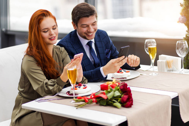 caucasian couple celebrate birthday in restaurant - 写真・画像
