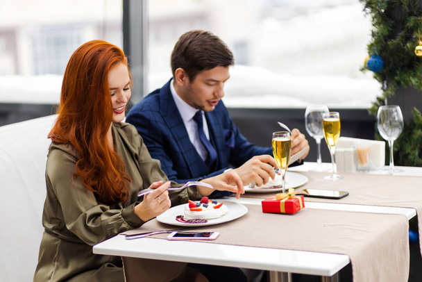 lovely couple spend time together in restaurant - Fotoğraf, Görsel