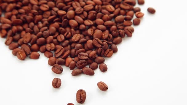 Coffee beans on white background - Felvétel, videó