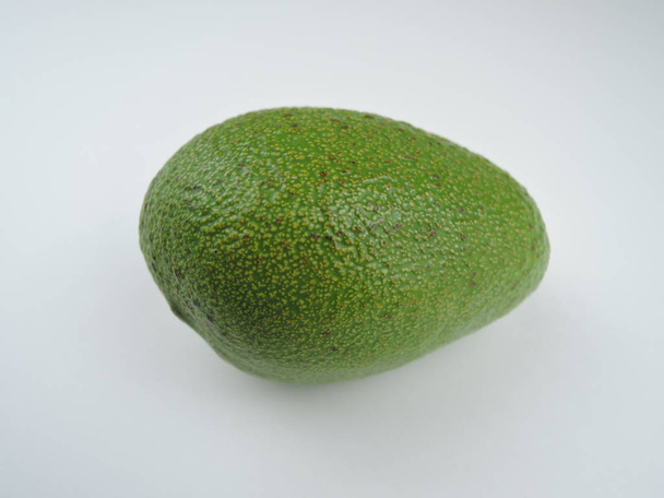 ripe green avocado on a white background isolated - Photo, Image