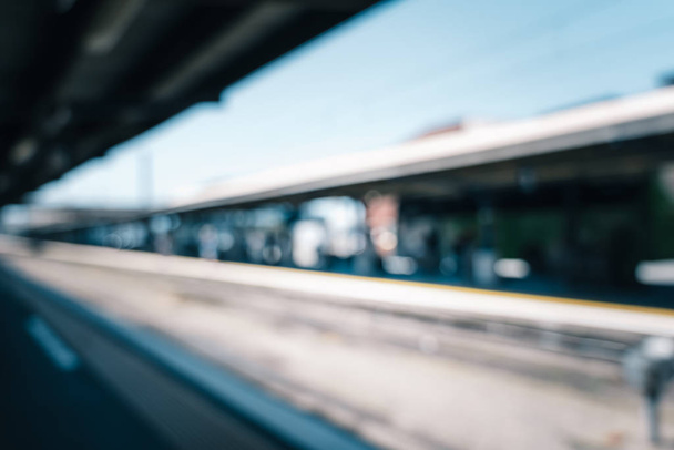 Blur image of People passing through Wellington Railway Station, - Photo, image