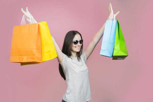 beautiful girl holding shopping bags - Фото, изображение