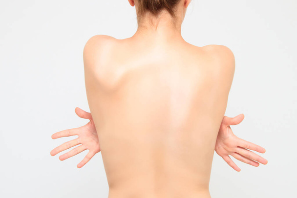 Woman is showing her back - Photo, Image