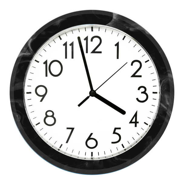 Black wall clock. Isolated on white background. High quality photo. - Photo, Image