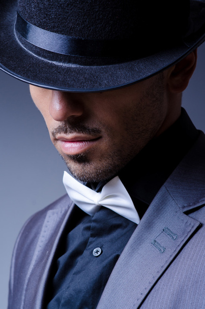 Businessman in old style hat - Фото, изображение
