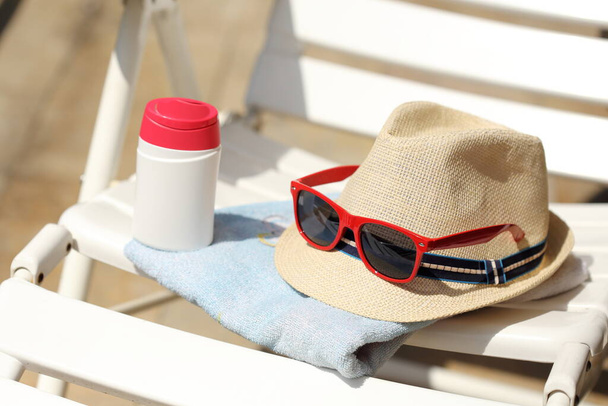 sun hat,sunglasses and sun milk - Photo, image