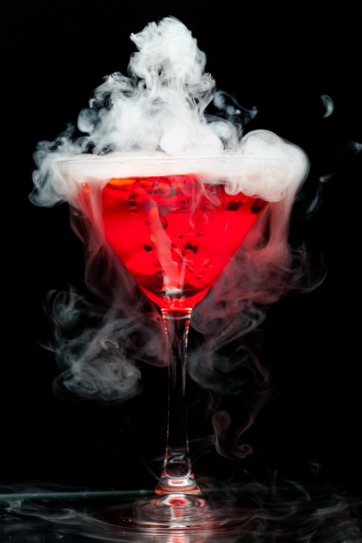 red cocktail with ice vapor - Foto, Imagem
