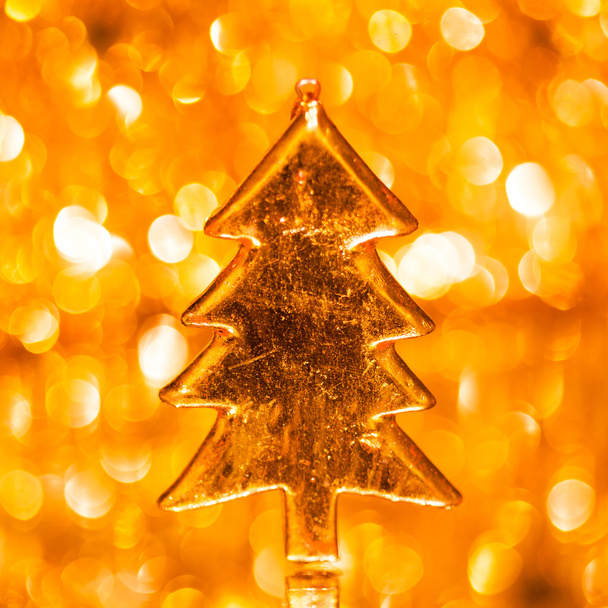 Árbol de Navidad sobre fondo brillante
 - Foto, imagen