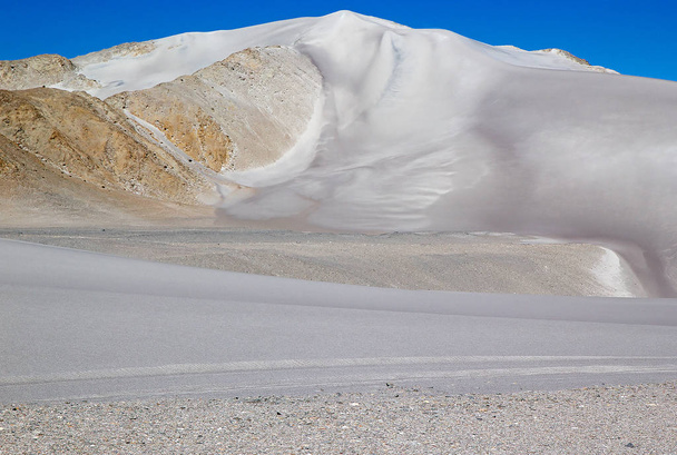White dune at the lava field of the volcano Caraci Pampa at the Puna de Atacama, Argentina - Photo, Image