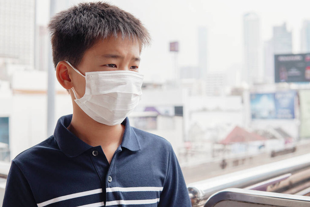 Middle aged Asian man wearing glasses and medical face mask,  Wu - Foto, Imagen