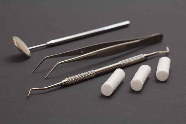 Set of metal dental instruments for teeth dental care - Photo, image