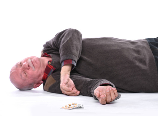 Healthcare and medicine concept. Senior man falling down from stroke or heart attack - Photo, Image