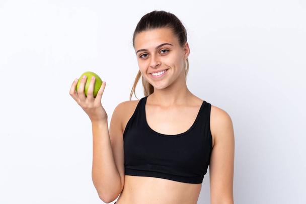 Adolescente avec une pomme sur fond isolé
 - Photo, image