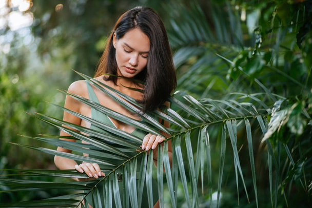 young beautiful lady in tropical rainforest - Fotoğraf, Görsel
