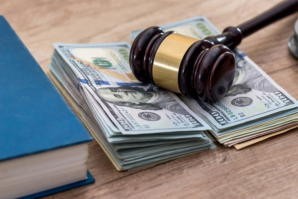 us Money with wooden hammer handcuffs, law  book - Photo, Image