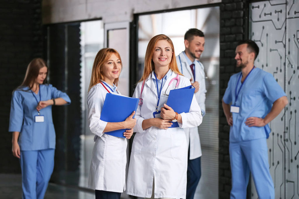 Female doctors in hall of clinic - Photo, Image