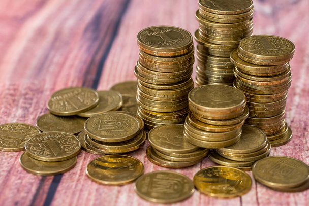 Stack of coins on wooden table  . - Foto, Imagem