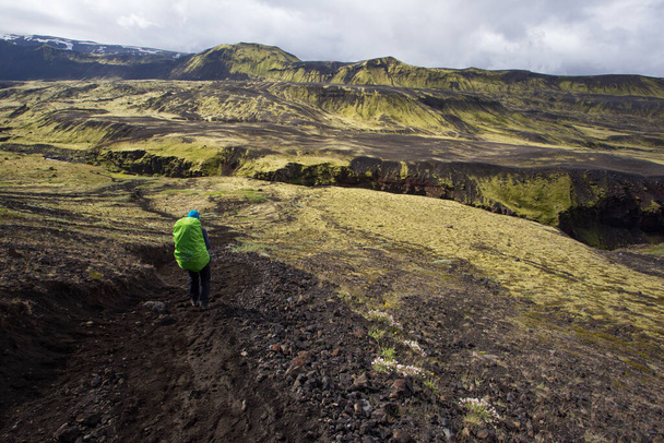 Woman traveler hiking the Laugavegur trail in Iceland, Europe. - Φωτογραφία, εικόνα