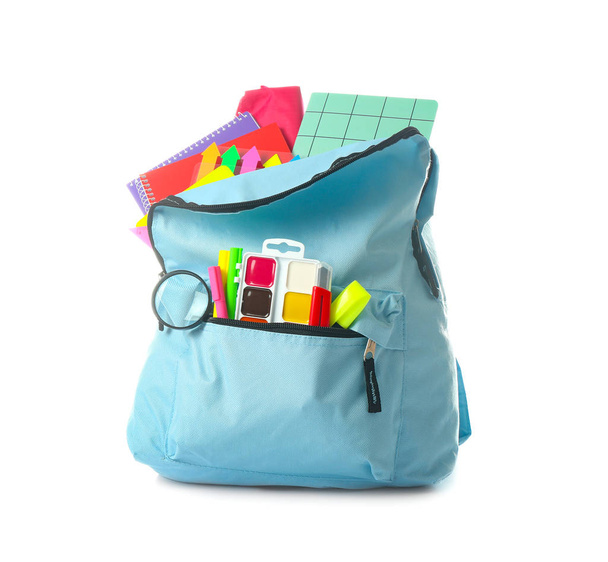 School backpack with stationery on white background - Photo, Image