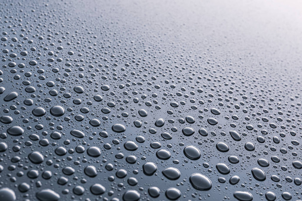 Water drops on grey background - Foto, Bild