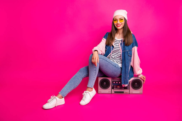 Full length body size view of her she nice attractive charming pretty lovely cheerful girl sitting on boom-box spending holiday isolated on bright vivid shine vibrant pink fuchsia color background - Φωτογραφία, εικόνα