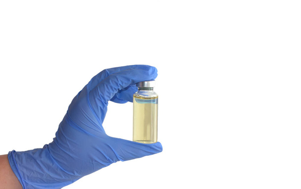 hyaluronic acid bottle in doctor's hand. Beauty invasive technology concept. - Photo, Image