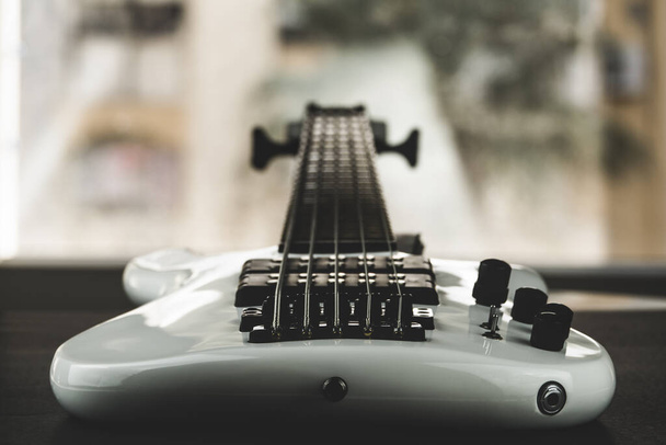 closeup of electrical bass guitar - Foto, imagen