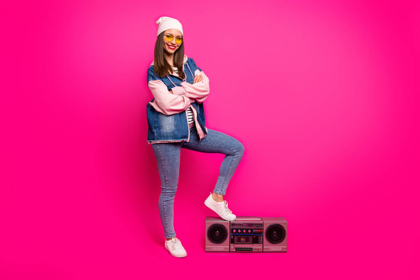 Full length body size view of her she nice attractive winsome cool cheerful cheery girl putting leg on boom-box having fun holiday isolated on bright vivid shine vibrant pink fuchsia color background - Foto, Bild
