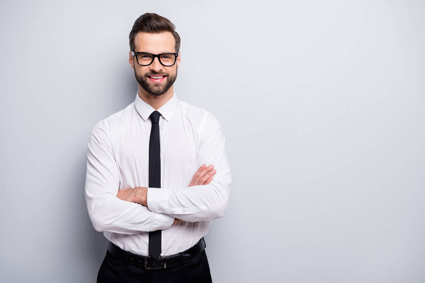 Photo of handsome young business man bossy crossed arms friendly smiling meet colleagues partners wear specs white office shirt black trousers tie isolated grey color background - Valokuva, kuva