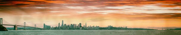 Panoramic view of San Francisco skyline from the ocean at sunset - Photo, Image