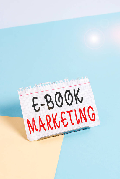 Text sign showing E Book Marketing. Business photo text digital file that can be used on any compatible computer Paper placed tilted above buffer wire on soft pastel multi colours backdrop - Photo, Image