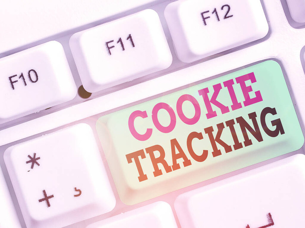 Handschrift Text-Cookie-Tracking. Konzept, d.h. Daten, die auf dem Computer des Nutzers nach der besuchten Website gespeichert werden. - Foto, Bild