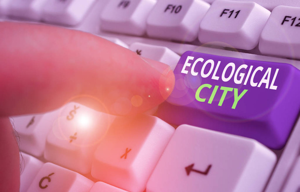 Writing note showing Ecological City. Business concept for huanalysis settlement modeled on the self sustaining structure - 写真・画像
